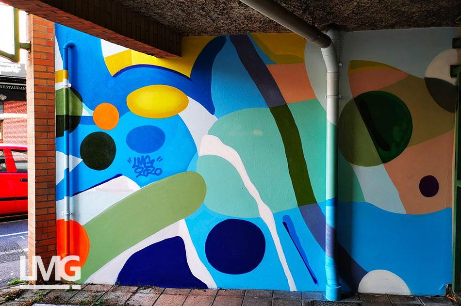 decoration graffiti artiste art urbain bas immeuble toulouse